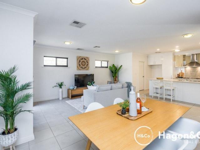 Private & Low Maintenance Living in a Convenient Location