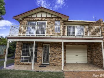 Private, Low Maintenance Living in a Peaceful Setting