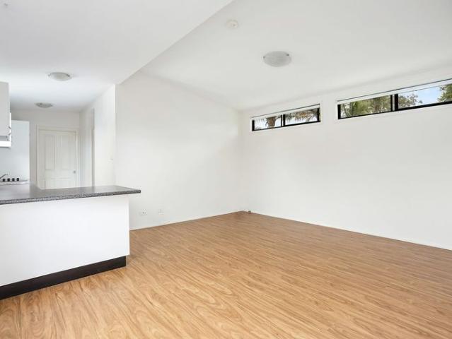 Private, Low Maintenance Living with Escarpment Views