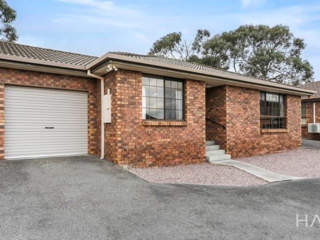 Private, Low Maintenance Living with Parkside Convenience