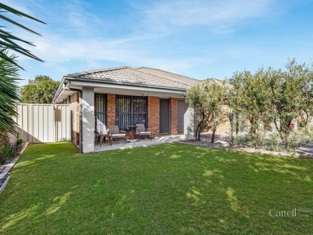 Private, Low Maintenance Living with Strong Investment Appeal