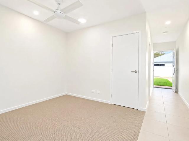 Private, Peaceful & Low Maintenance Living – Lawns & Gardens Included!