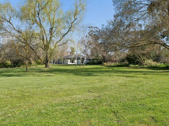 Private, polished and surrounded by established gardens.