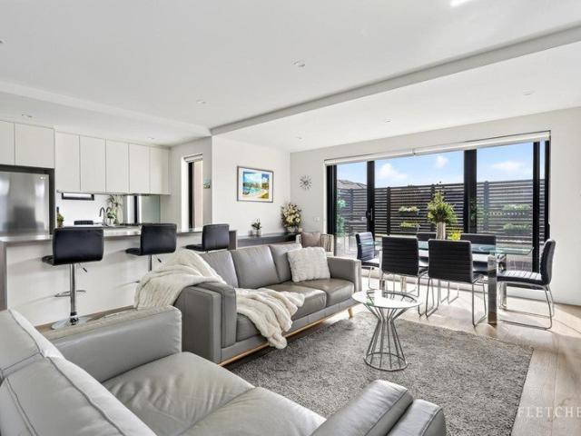 Private Rear Positioned Corner Apartment with Expansive North Facing Outdoor Living