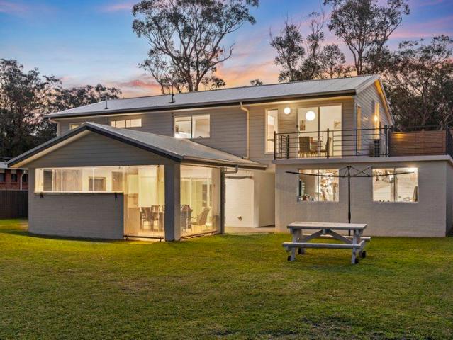 Private Riverfront Retreat with Exceptional Entertaining and Endless Space
