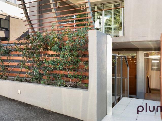 Private Street Entry, Two Courtyards, Zero Compromise