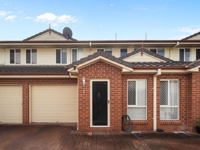 Private, Spacious & Perfectly Positioned Split Level Townhome in a Boutique Complex