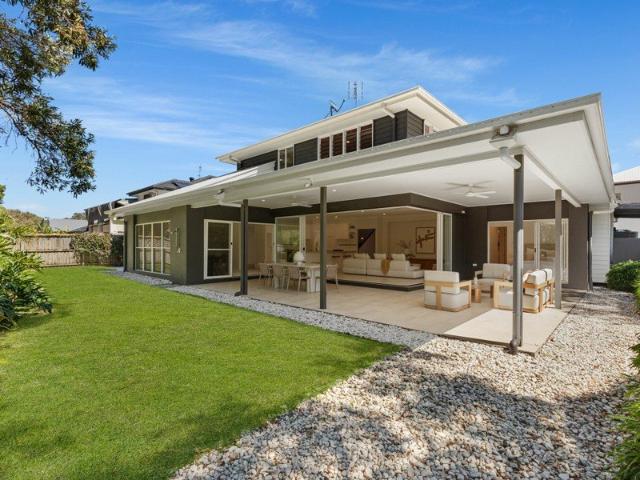 Private Twin Waters Retreat with Flexible 5 Bedroom Design on 816m2