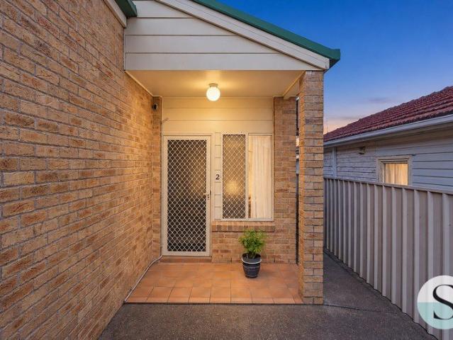 Private Two Bedroom Jesmond Unit, Light Filled Low Maintenance Living, Covered Outdoor Entertaining, Generous Courtyard, Split System Air And Garage