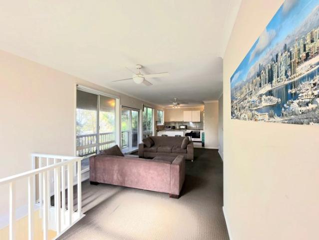 PRIVATE TWO BEDROOM UPPER LEVEL RESIDENCE IN CONVENIENT LOCATION