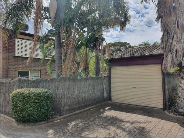 Private Townhouse with a fully fenced yard