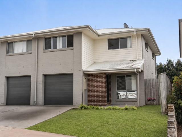 Private Townhouse Living in the Popular Northquarter Estate!