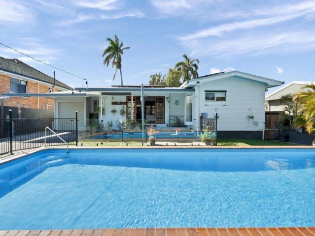 Private Tropical Oasis with Resort Style Pool, Character Charm & Exceptional Outdoor Living