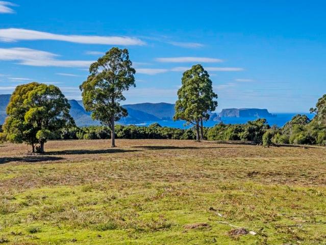 Private Wilderness Retreat with Breathtaking Water Views Over 50 Acres Adjoining National Park