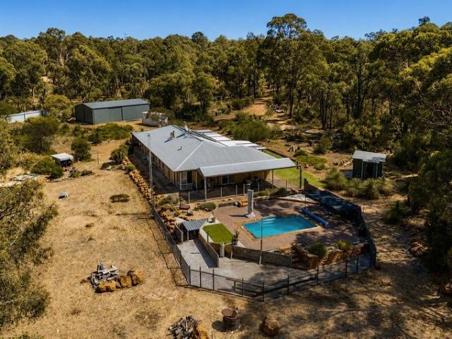 PRIVATE 10 ACRES WITH 5x2 RAMMED EARTH MULTI GEN HOME