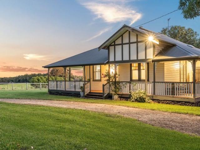 Private 4.9 Acre Estate with Character Home, Stables and Lush Rural Outlooks