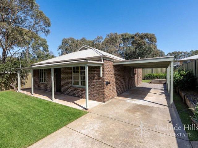Privately Positioned & Beautifully Refreshed walking distance to Aston Hills Golf Course