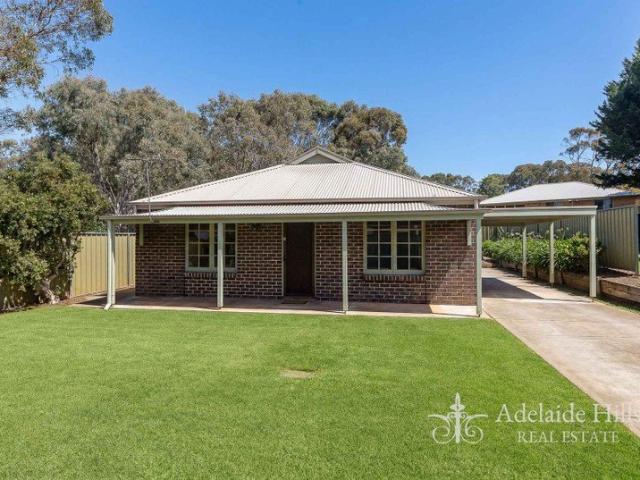 Privately Positioned & Beautifully Refreshed walking distance to Aston Hills Golf Course