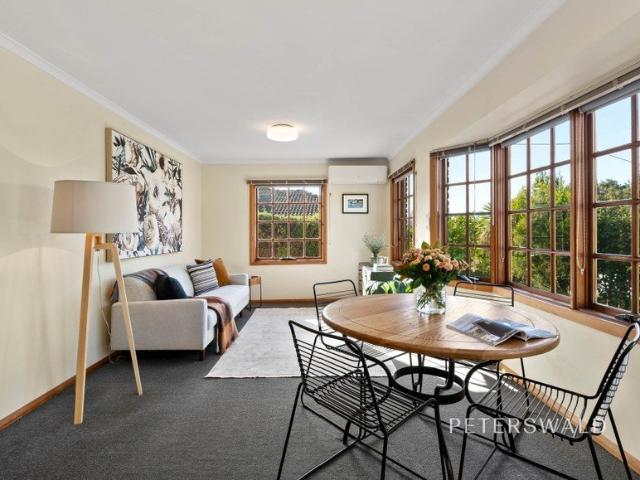 Privately positioned on coveted Waimea Avenue