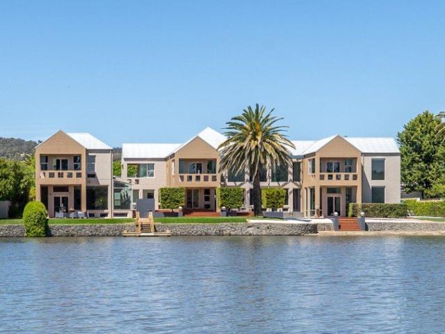 Prized waterfront residence of 870m2 with indoor pool on 1,974m land holding