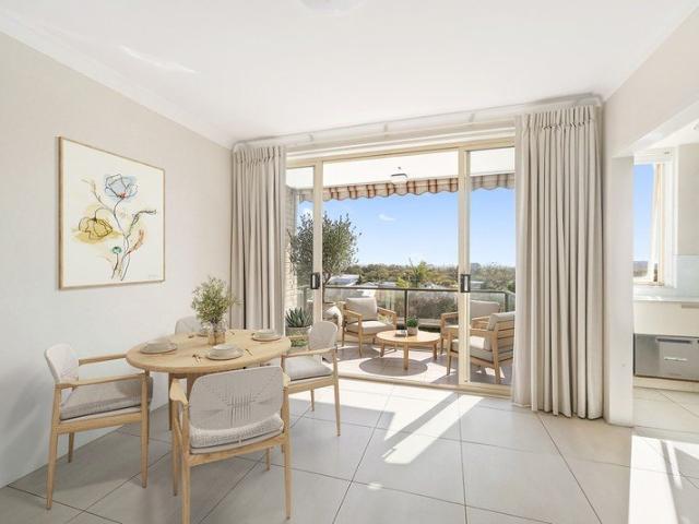 Prime Beachside Living with District Views