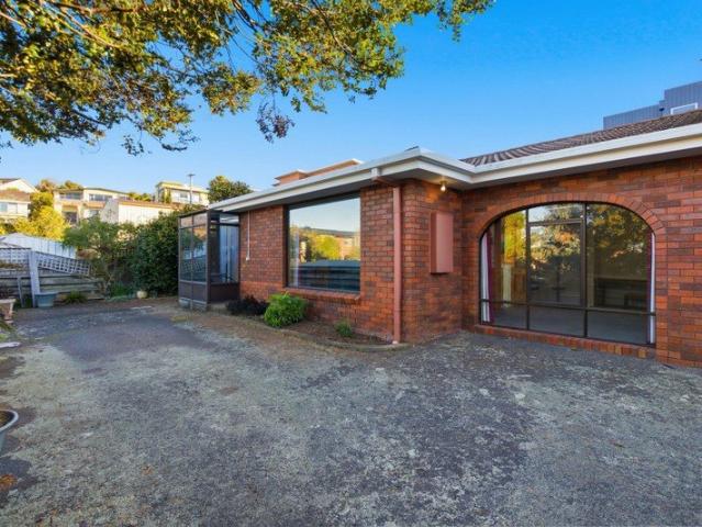 Prime Bluff Location Comfortable Living with Outstanding Potential