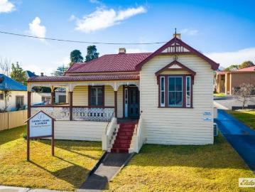 OPPORTUNITY KNOCKS HERE! CLASSIC BEGA BUILDING WITH OPTIONS GALORE