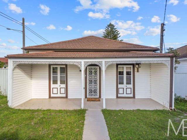 Prime Corner Opportunity with Exciting Duplex Potential STCA