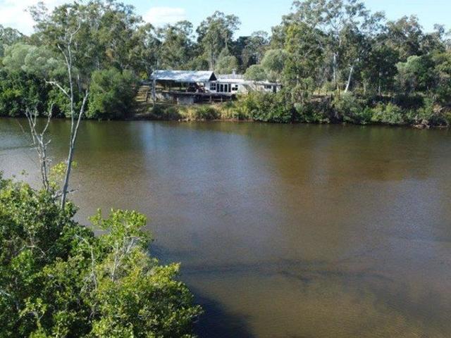PRIME CREEKFRONT OPPORTUNITY IN THE HEART OF BAFFLE CREEK TWO TITLES, ENDLESS POTENTIAL