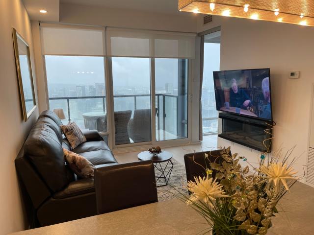 Prime Downtown Toronto Fully Furnished Condo for Rent – Elegant 1 Bed plus den, 1 Bath with City Views and Fireplace