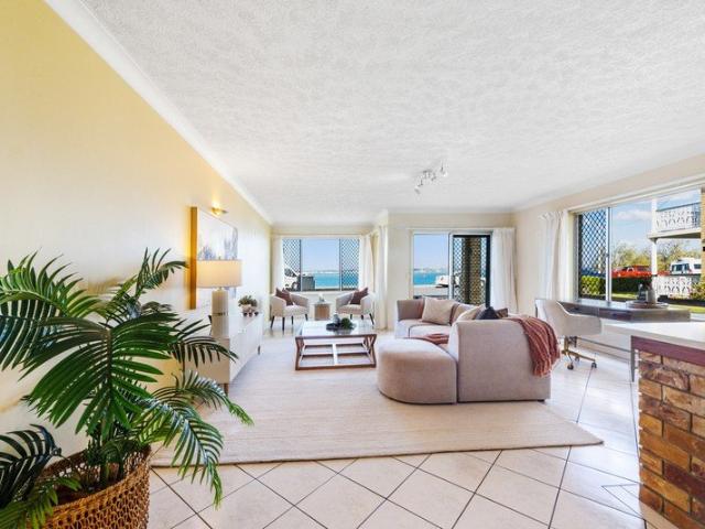 Prime Ground Floor Esplanade Living with Uninterrupted Panoramic Broadwater Views