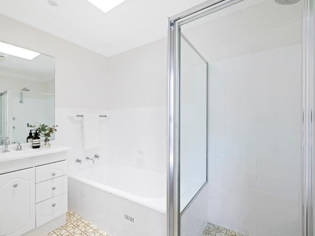 Prime harbourside location with breathtaking views & footsteps to Castle Rock beach