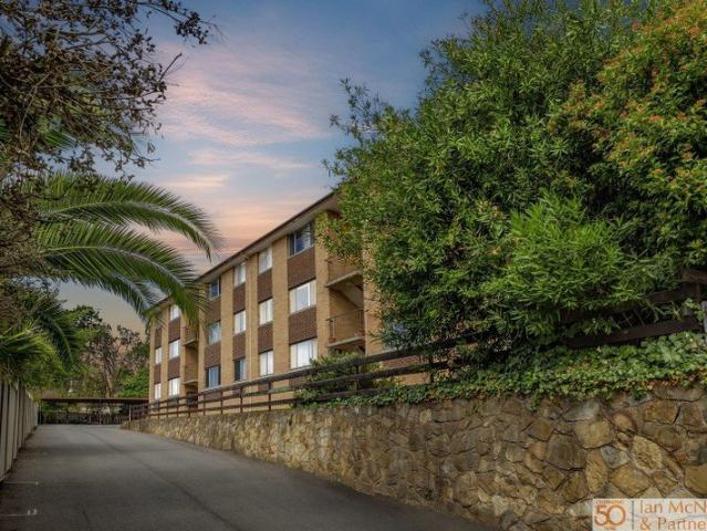 Prime Investment Opportunity: Sunlit Top Floor Unit with Stunning Views