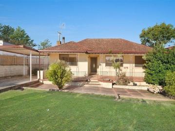 Prime Knockdown/Rebuild or Future Development Opportunity with Main Road Exposure