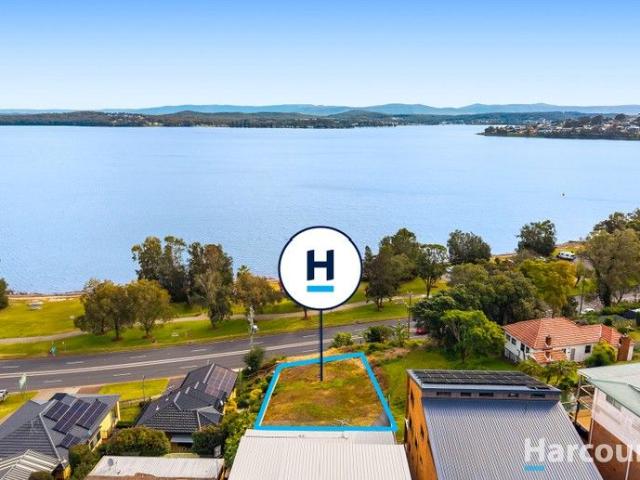Prime Lakefront Opportunity Rare Vacant Block!