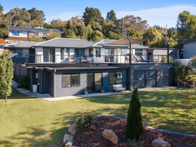 Prime Lakefront Living On Rushes Bay with Exceptional Views & Self Contained Granny Flat