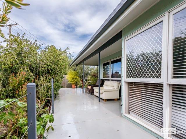 Prime Location with Lake Views & Established Orchard