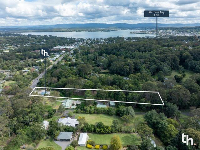Prime Position on 2.5 Acres in Endlessly Desirable Setting