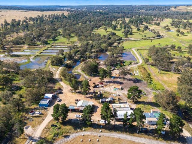 PRIME RIVERFRONT ACERAGE 194Acres 5 titled lots OFF GRID