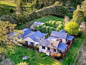 Prime Riverside Estate on Large Acres with Breathtaking Views