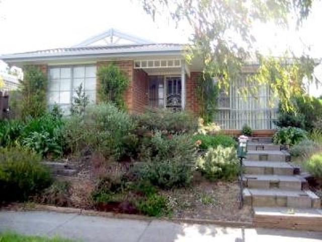 PRIMELY LOCATED FOUR BEDROOM FAMILY HOME!