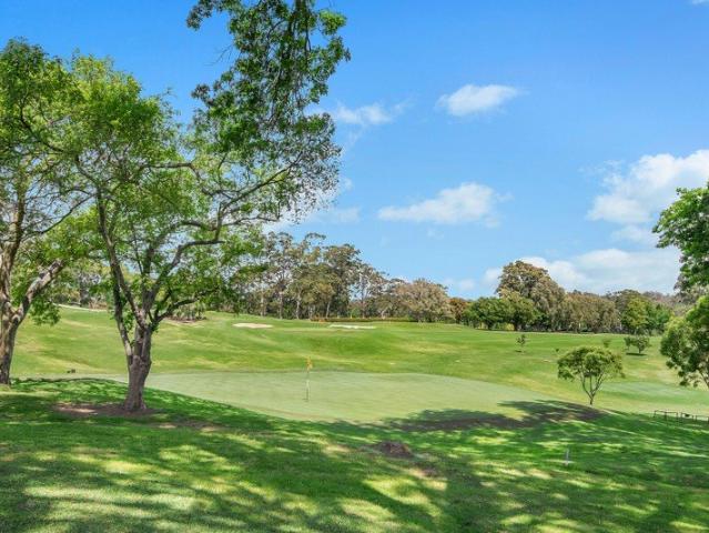 Pristine apartment with golf course panorama offering everyday tranquility