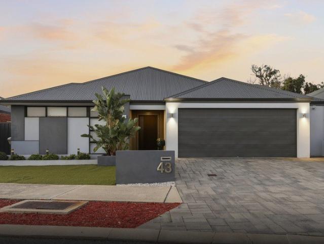 PRISTINE FAMILY RESIDENCE, WITH AN EXECUTIVE INTERIOR DESIGN AND A POOLSIDE RETREAT TO THE BACKYARD