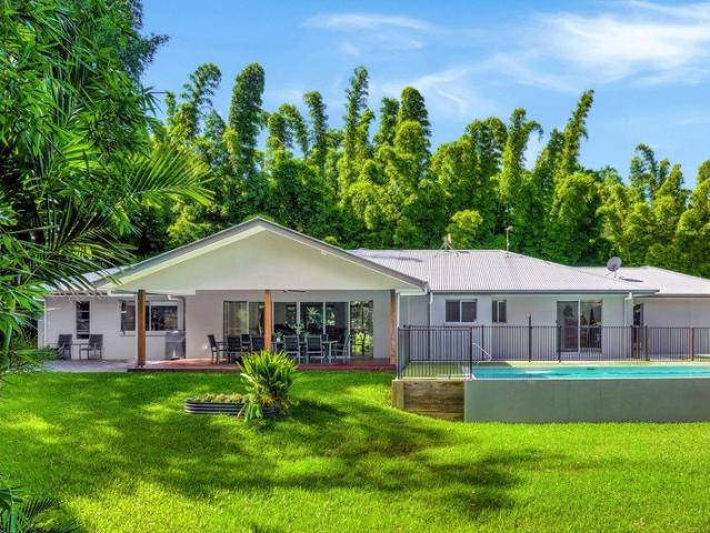PRISTINE HOME IN TRANQUIL GARDEN SETTING WITH POOL, SHED AND STUDIO