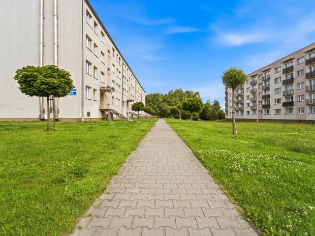 Sprzedam jasne 2 pok. z ogrodem, balkonem i garażem