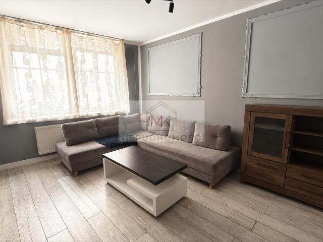 Przestronne 2 pokojowe mieszkanie z potencjałem 57 m² w Brzegu
