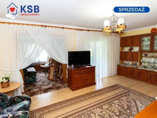 Przestronny dom 116 m² z garażem, balkonami i ogrodem