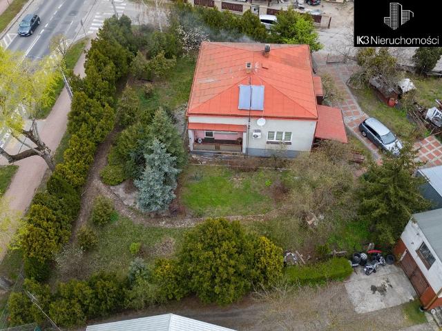 Przestronny dom 90 m² z garażem na dużej działce 1025 m²