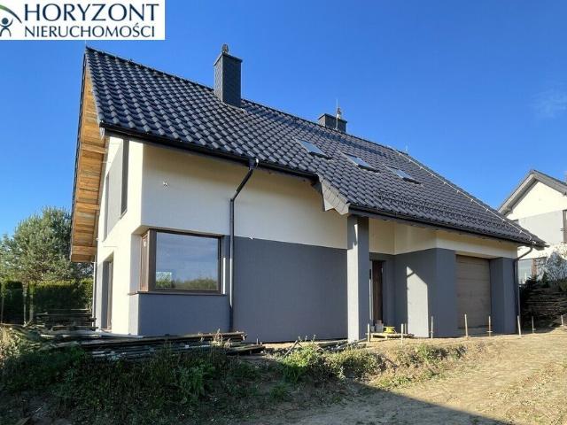 Zapraszam do obejrzenia nowoczesnego domu 136 m² z garażem i ogrodem