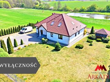 Przestronny dom z garażem i możliwością dokupienia działki ze stawem